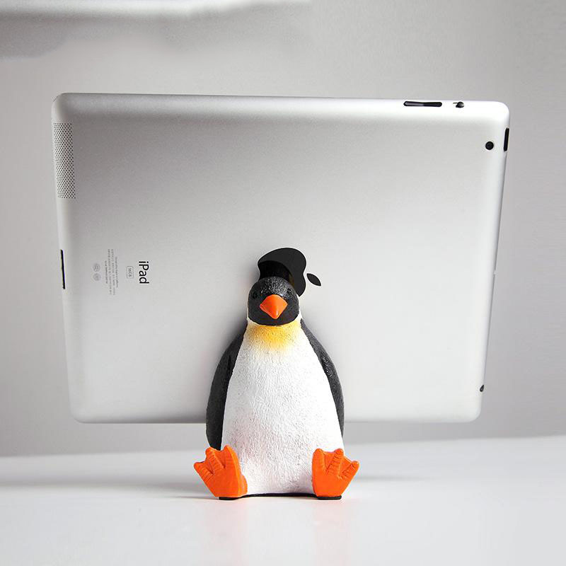 Penguin Sitting On The Ground Ipad Holder Phone Stand